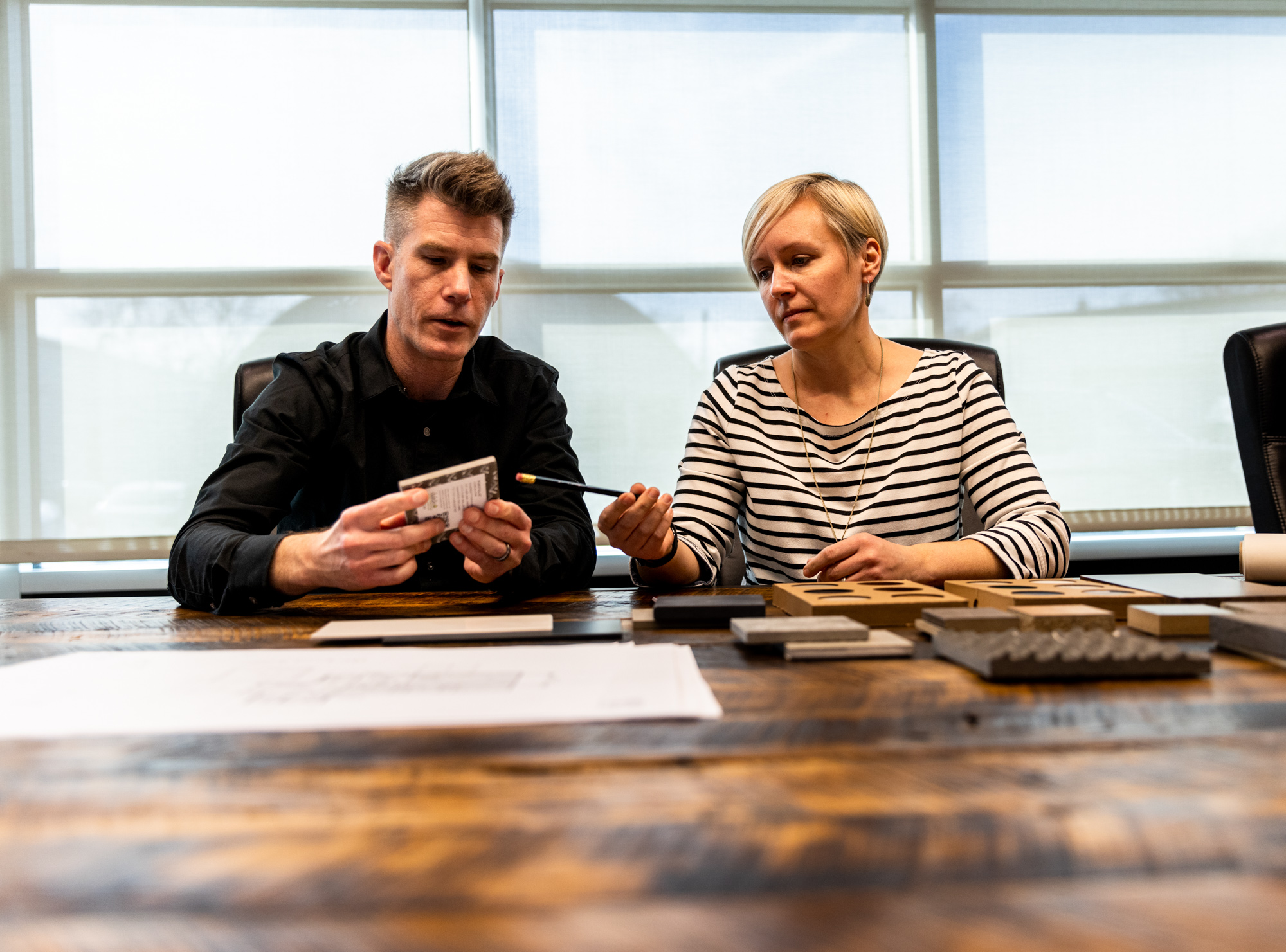 A pair of architects collaborate to create innovative designs for their clients. At Lifted Logic, we help you discover how to market your architecture firm so you can focus on doing what you love.