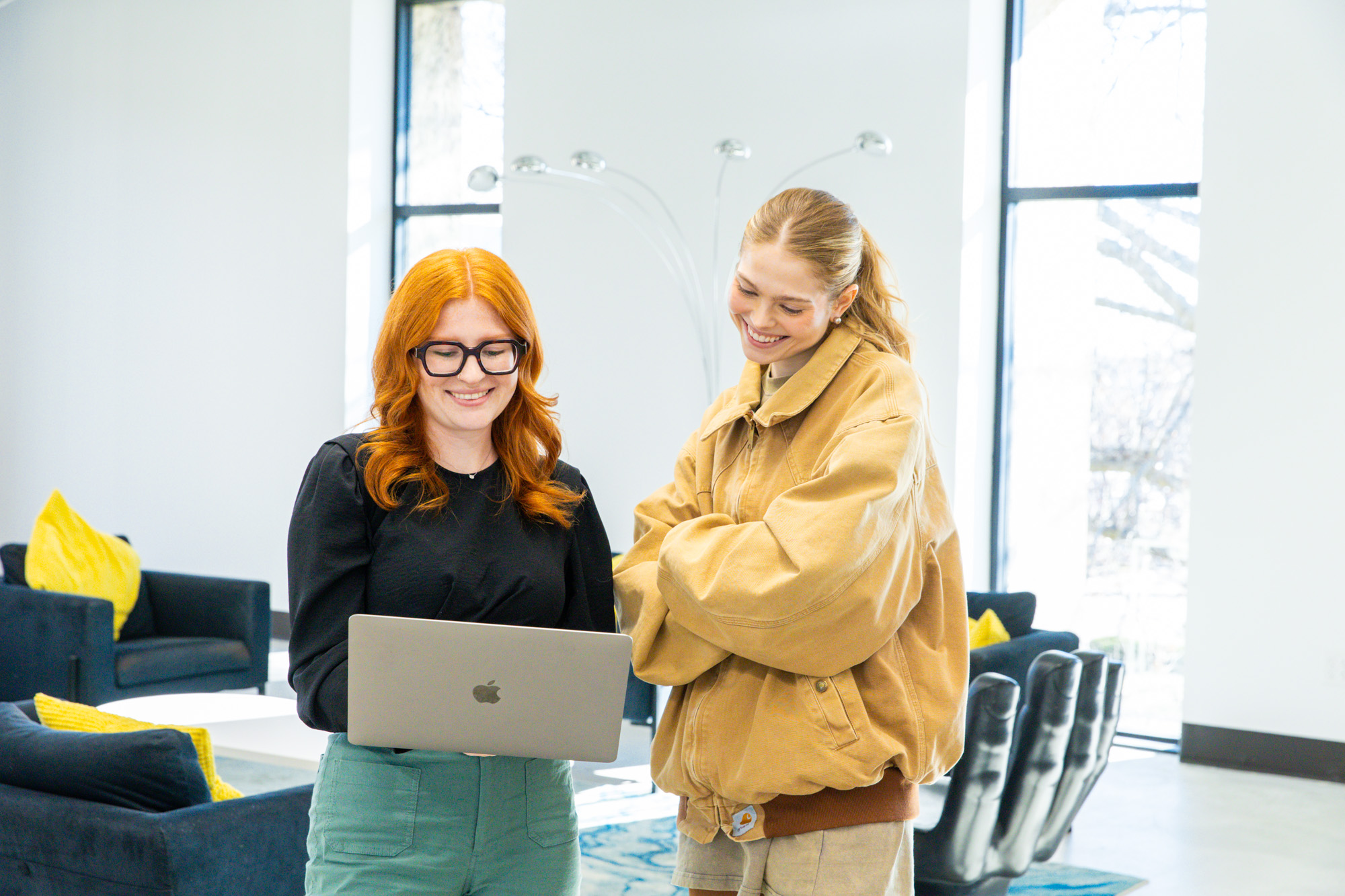 Two of Lifted Logic's marketing strategists checking our website's Google SERP ranking, and creating custom strategies to get to the top. 