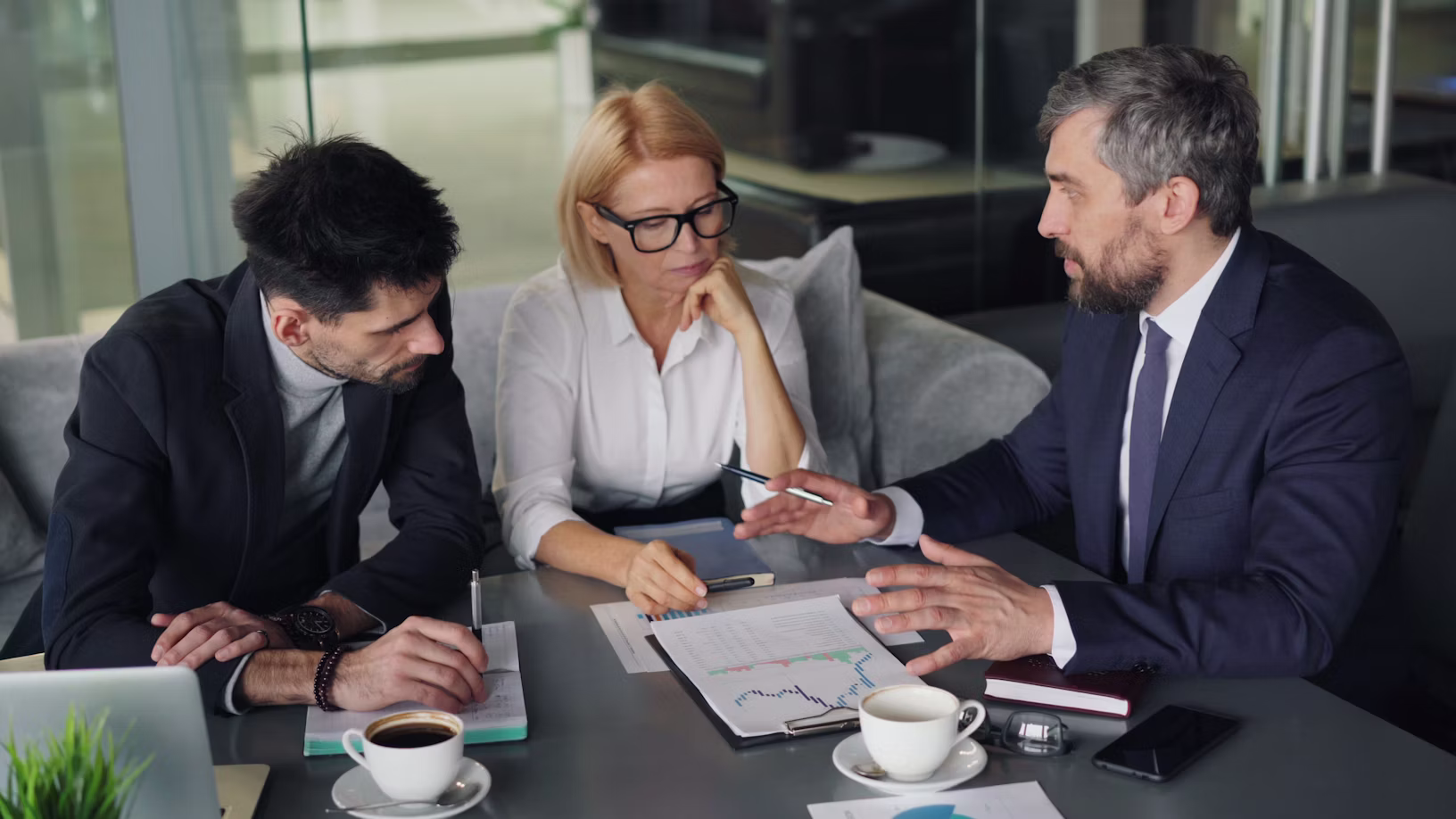 Fractional CMO meeting with executives to oversee agency performance and close the marketing leadership gap.